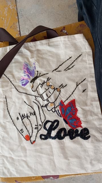 Bolsa love de manta cruda
