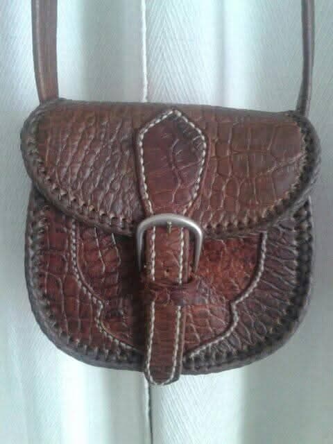 Bolso de mano en piel de cocodrilo